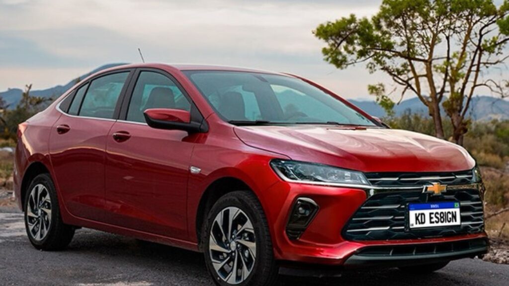Onix Plus 2026  vermelho na diagonal.